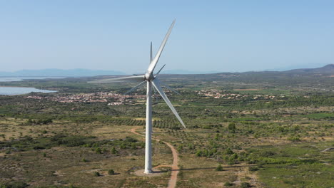 Wind-turbines-in-field-corbieres-France-aerial-optical-illusion-Aude-sunny-day